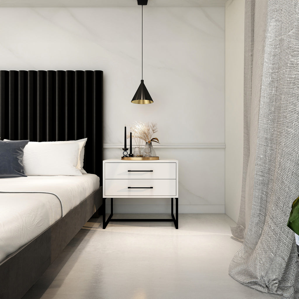 Modern bedroom with a bed, nightstand, and decorative elements.
